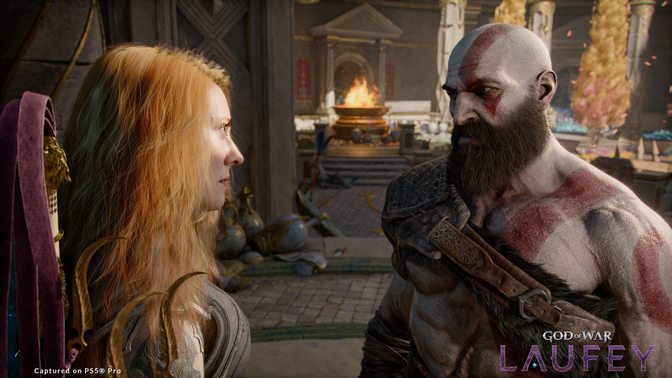 Faye e Kratos em cena de God of War Laufey