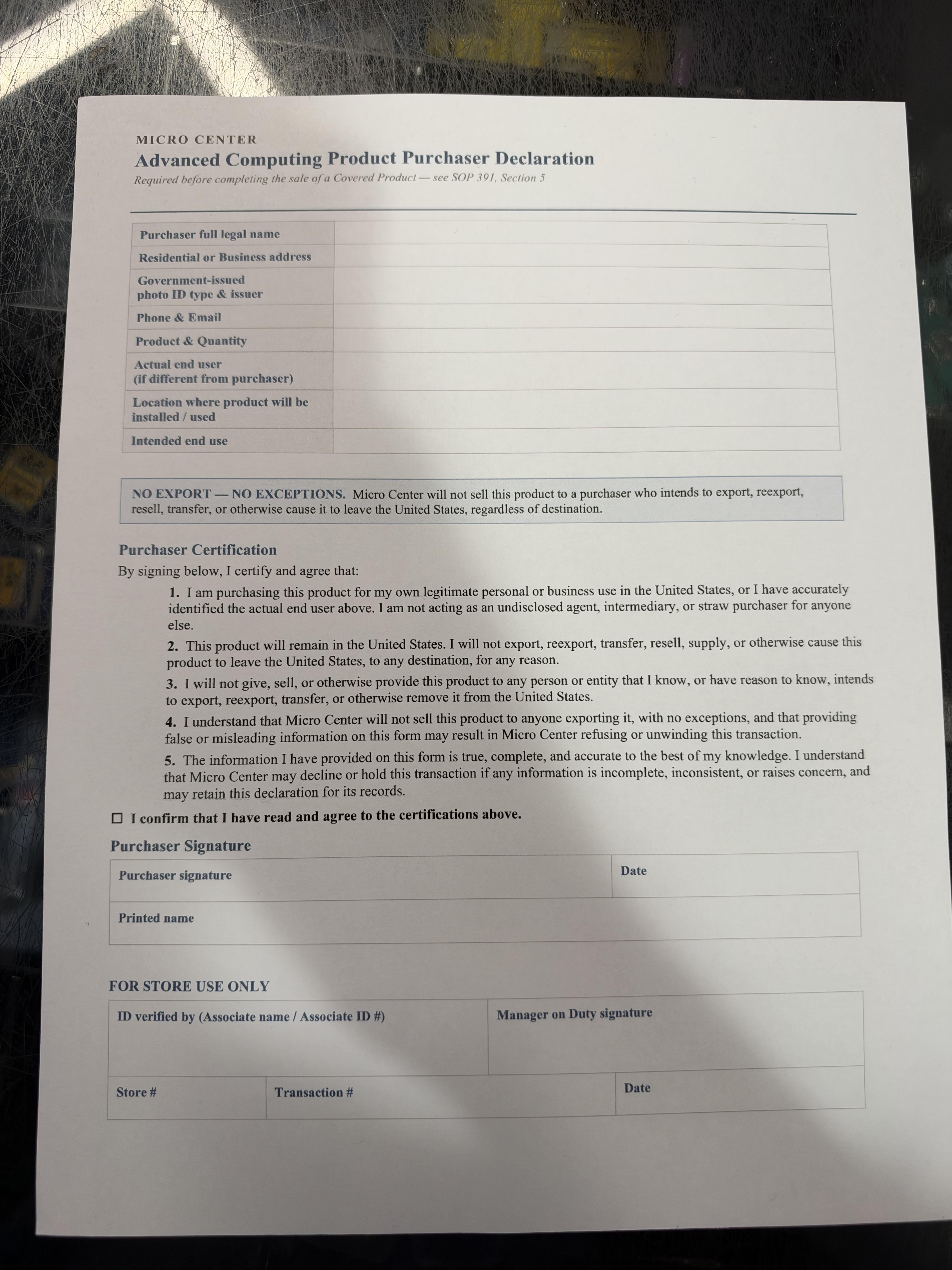 Formulário em branco da Micro Center fotografado pelo usuário Krothic, com a cláusula que impede a exportação