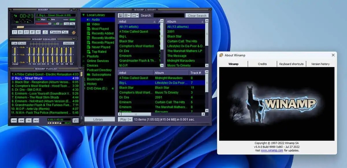 Interface clássica do Winamp com biblioteca de músicas e a janela "About Winamp"